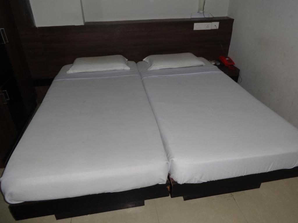 Hotel Miland Palace Bhubaneswar Oda fotoğraf